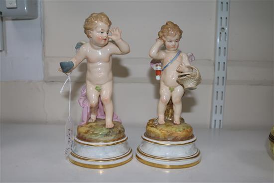 Two Meissen figures of Cupid, circa 1900, 20 cm and 21cm